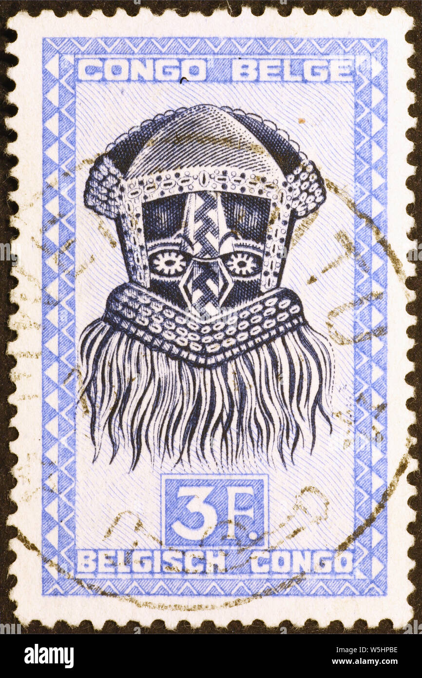 Afrikanische Holz- maske auf Briefmarke der belgischen Kongo Stockfoto