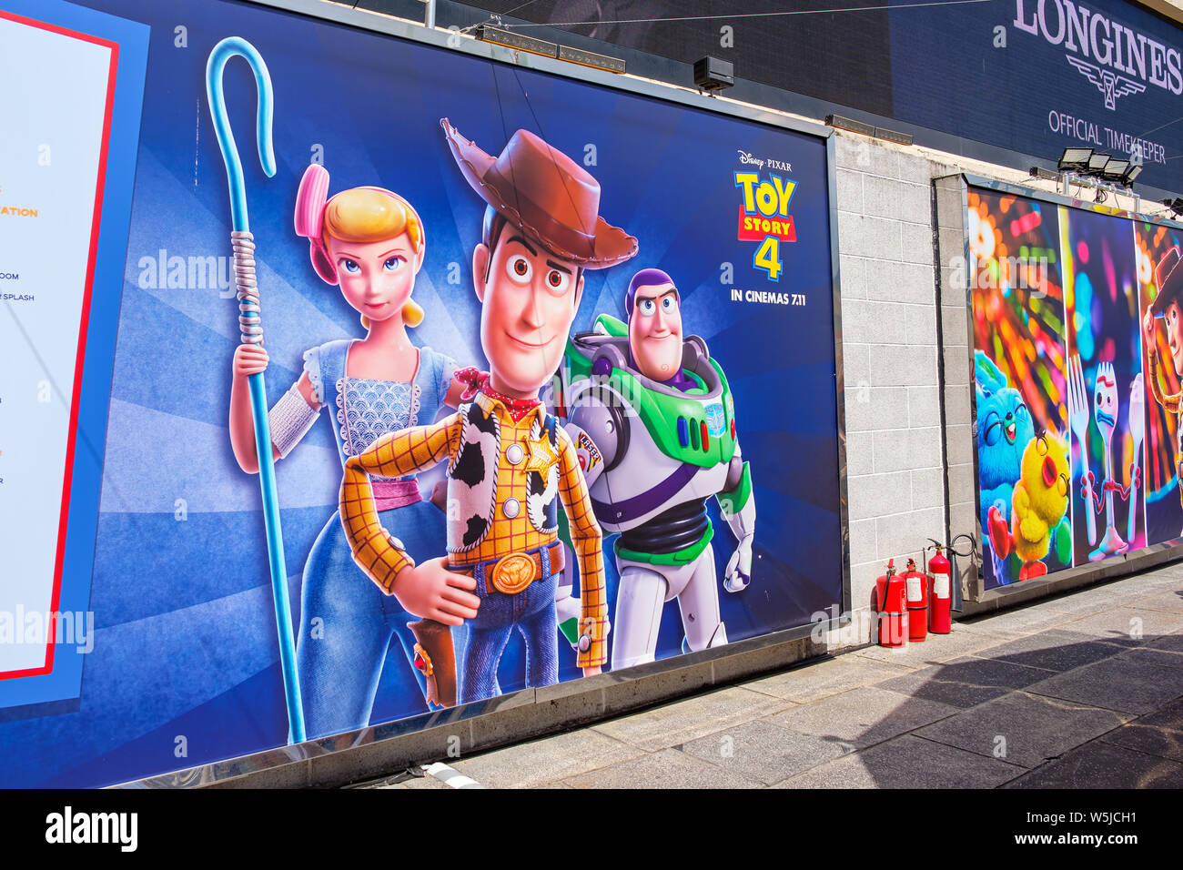 Hongkong - Juli 26, 2019: Disney und Pixar's "Toy Story 4" Film Hintergrund Anzeige mit Comicfiguren Ausstellung Aktivität im Hafen City, Tsim Sha Stockfoto