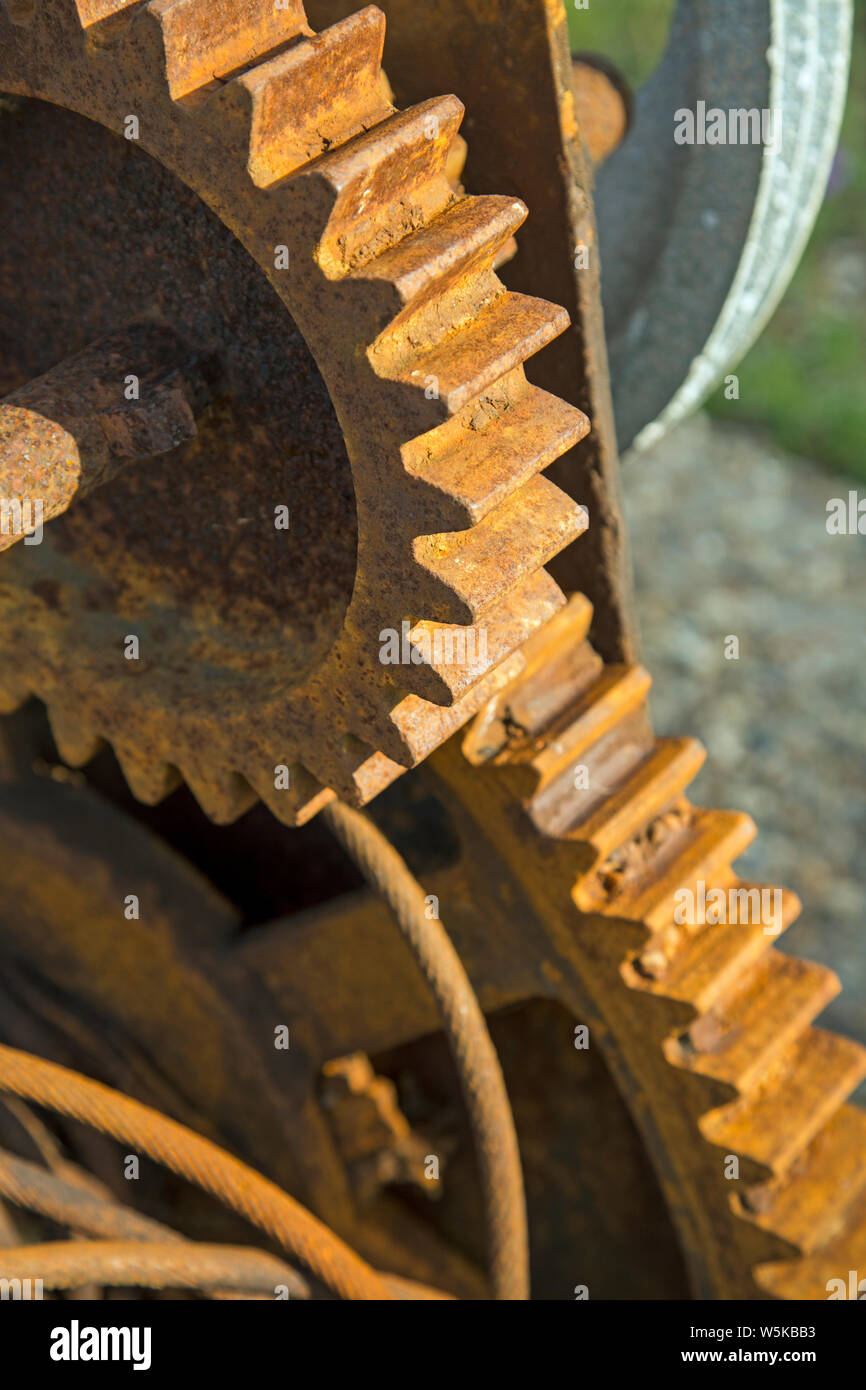 Nahaufnahme auf die Verrosteten Zahnräder einer Maschine Stockfoto