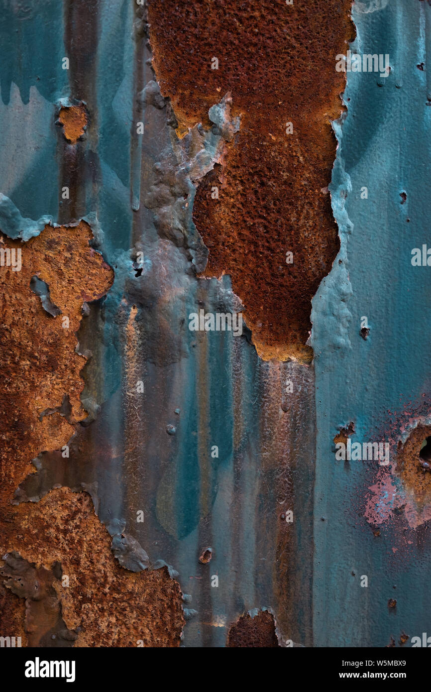 Texturierte industrielle Grunge Background-Peeling, rissig, korrodierte Farbe und Rost an der Wand. Stockfoto