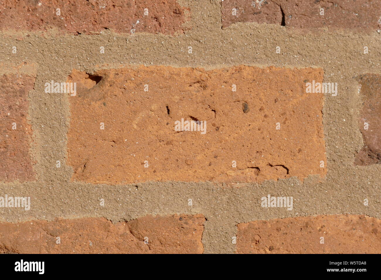 Rötliches Mauerwerk, Ziegel, Hintergrund image Stockfoto