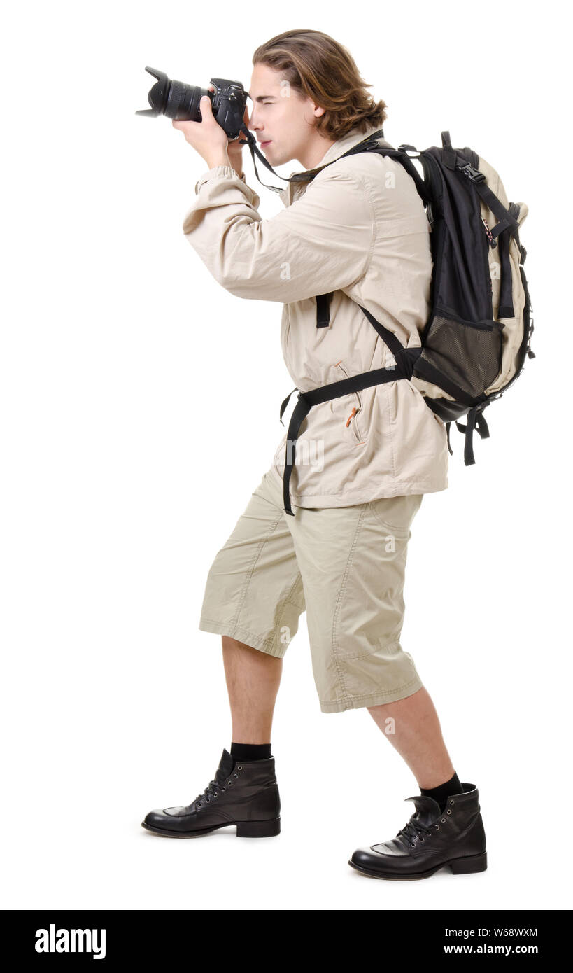 Junger Mann - Tourist mit Rucksack auf weißem Hintergrund Stockfoto