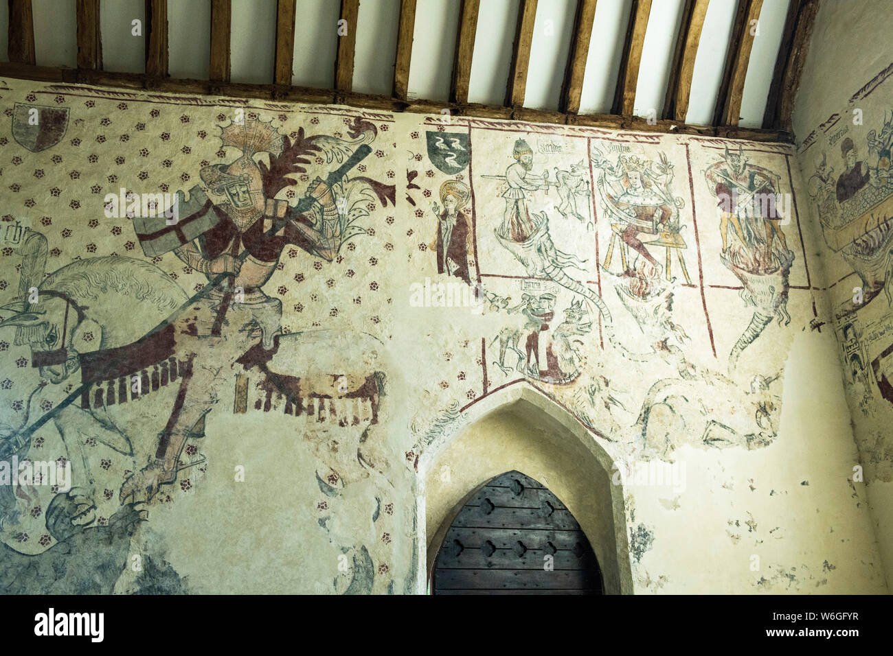 Die schönen alten Wandmalereien entdeckt auf den Mauern von St Cadocs Kirche in Llancarvan Vale von Glamorgan, South Wales. Stockfoto