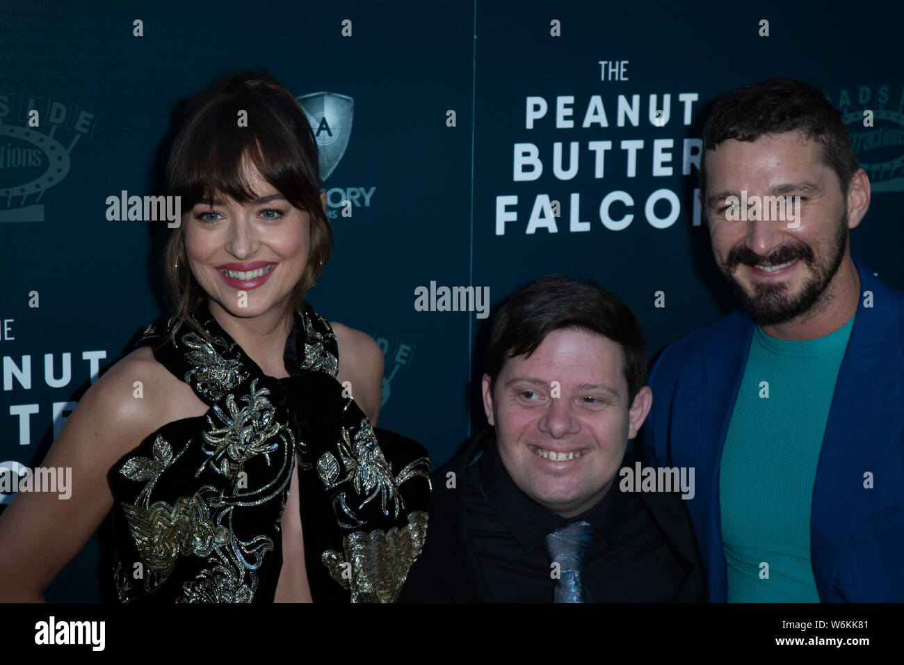 Los Angeles, USA. 12 Sep, 2018. Dakota Johnson, Zack Gottsagen und Shia LaBeouf der Special Screening der Erdnussbutter Falcon at ArcLight Hollywood Kinos besuchen am 1. August 2019 in Los Angeles, Kalifornien: Das Foto Access/Alamy leben Nachrichten Stockfoto