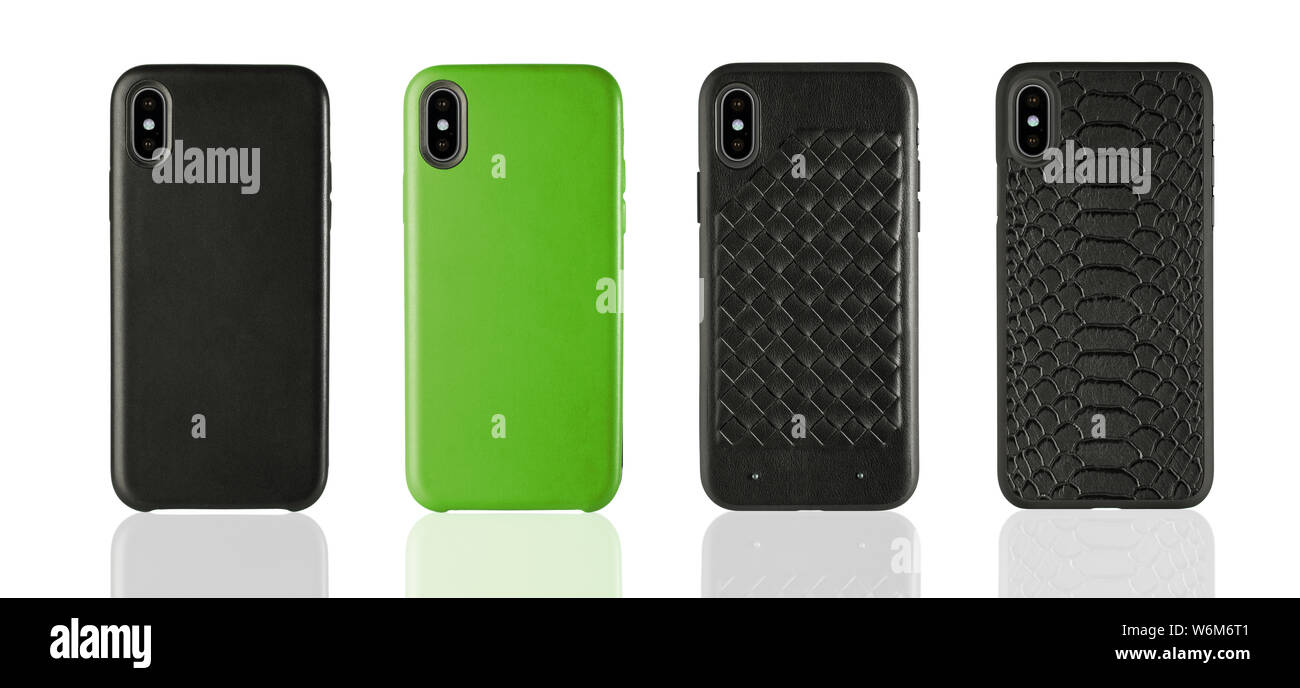 Vier Schwarze und Grüne Telefon Leder Fällen auf weißem Hintergrund isoliert, klassisches Design Zubehör. Stockfoto
