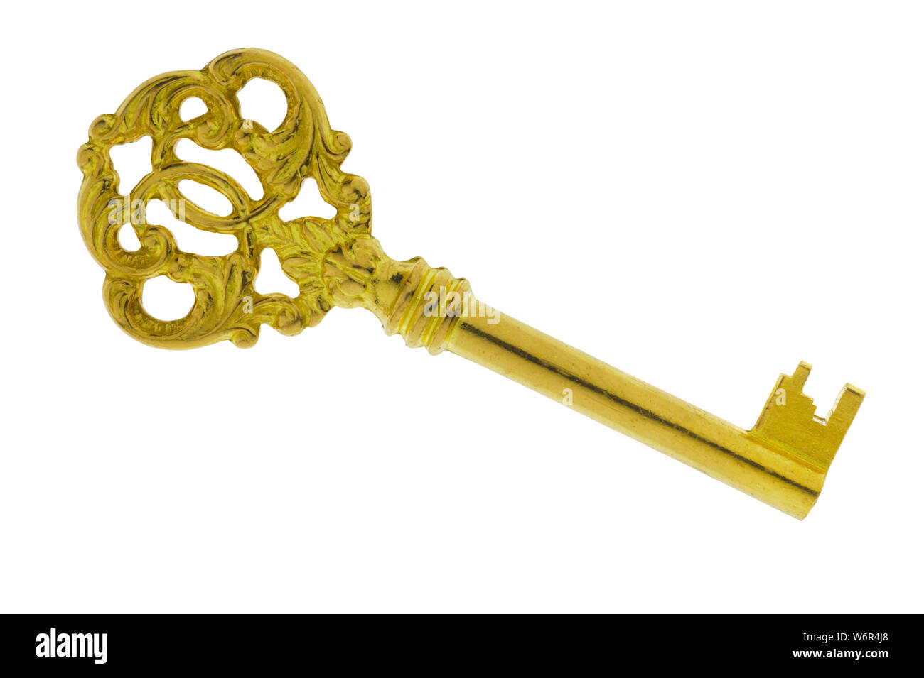 Goldene antike Schlüssel auf weißem Hintergrund Stockfoto