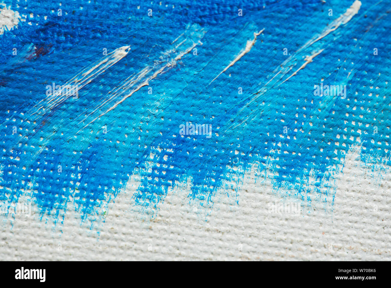 Blau und Weiß Lack Anschlag auf grobe Leinwand Textur Stockfoto