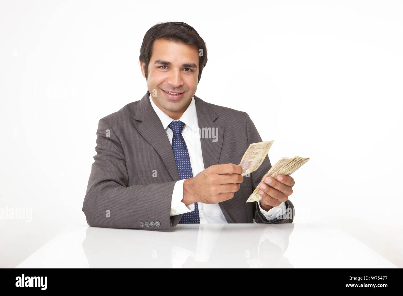 Geschäftsmann, Geld zählen Stockfoto