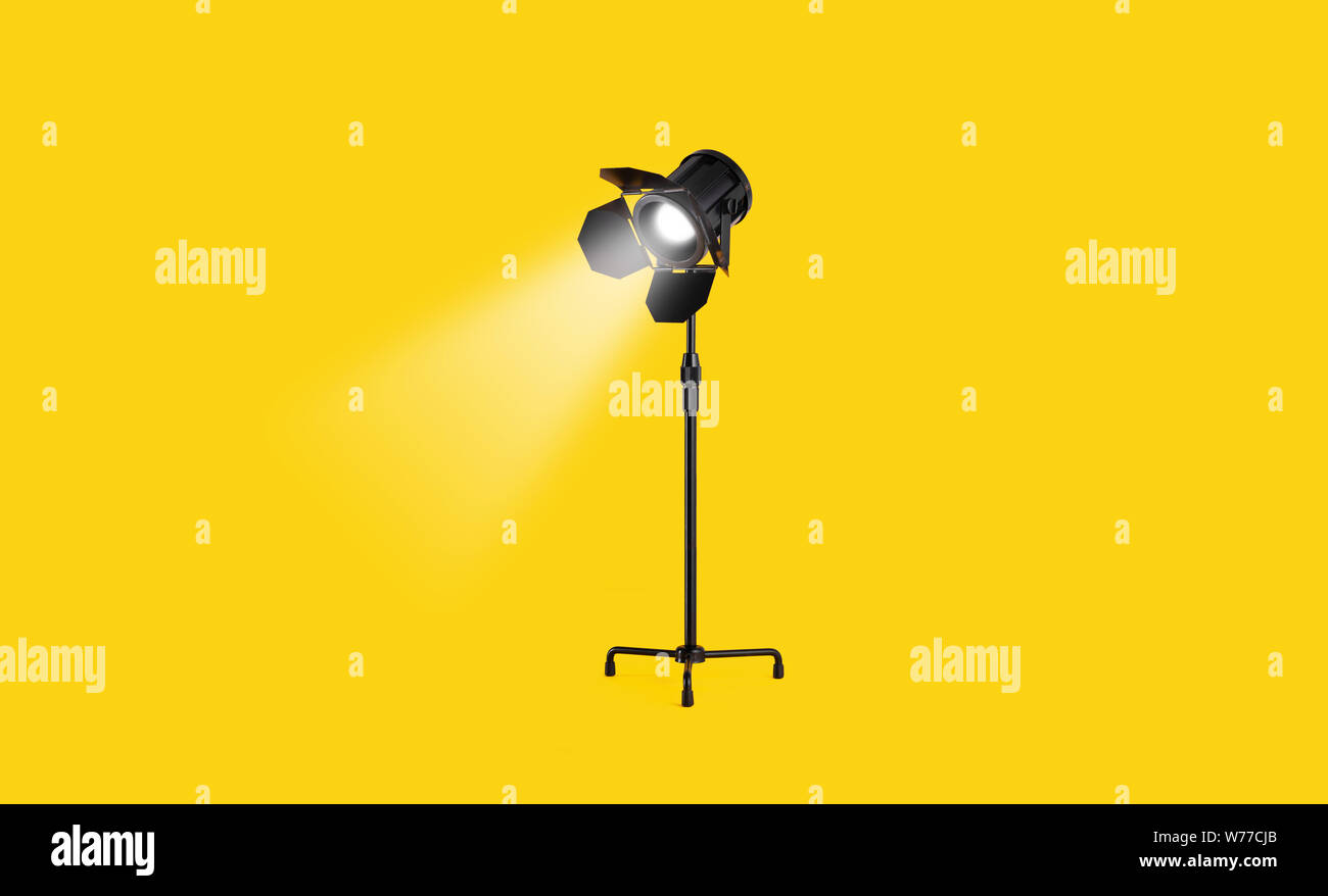Studio Lampe über gelben Hintergrund Stockfoto