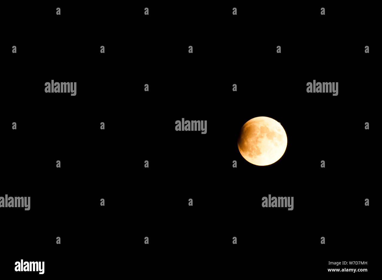 Partielle Sonnenfinsternis der Mond, frühen Stadium Stockfoto