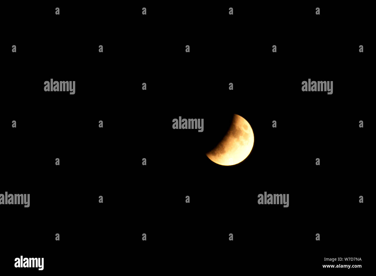 Partielle Sonnenfinsternis der Mond, frühen Stadium Stockfoto