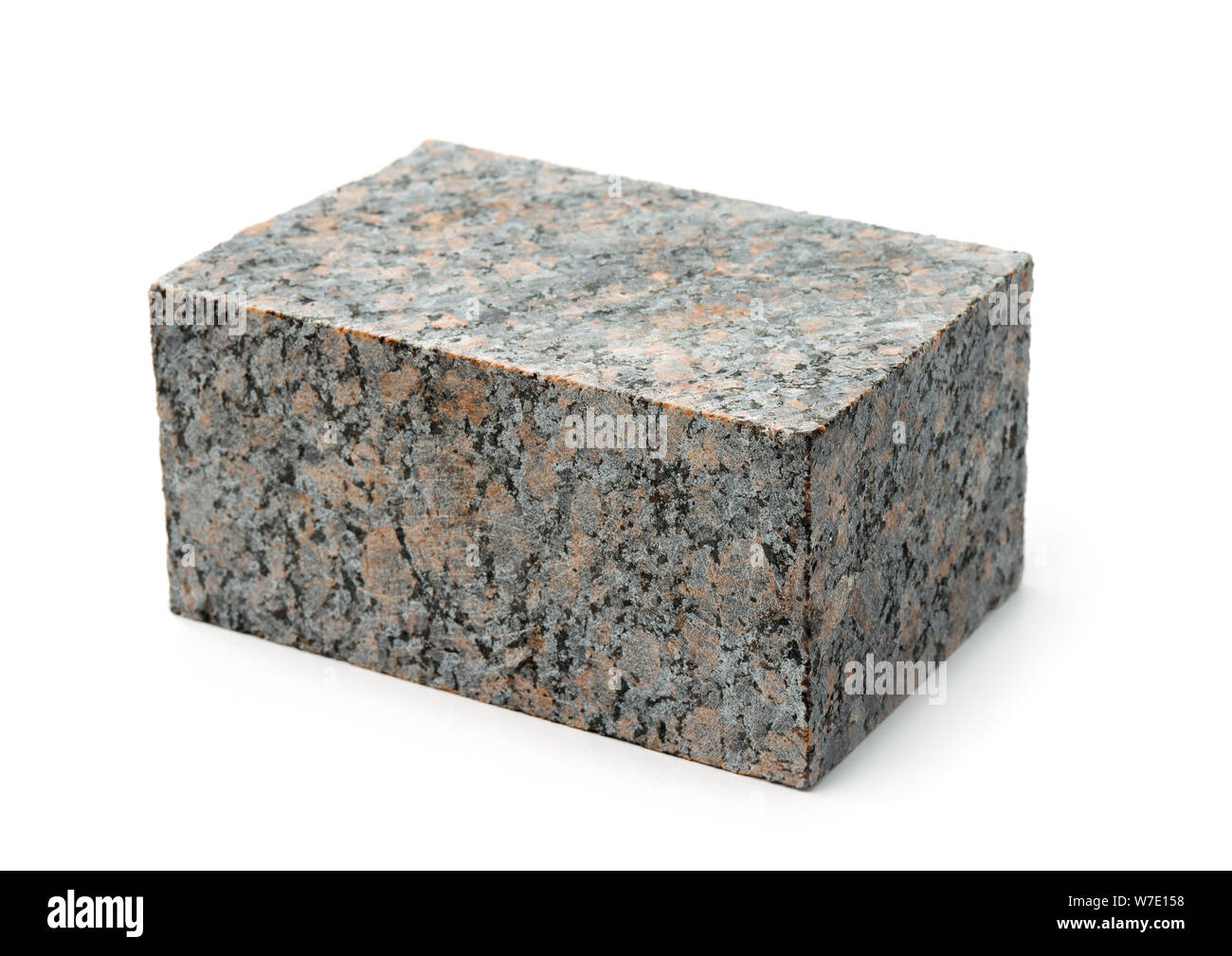Block der natürlichen unpoliertem Granit Stein auf Weiß isoliert Stockfoto