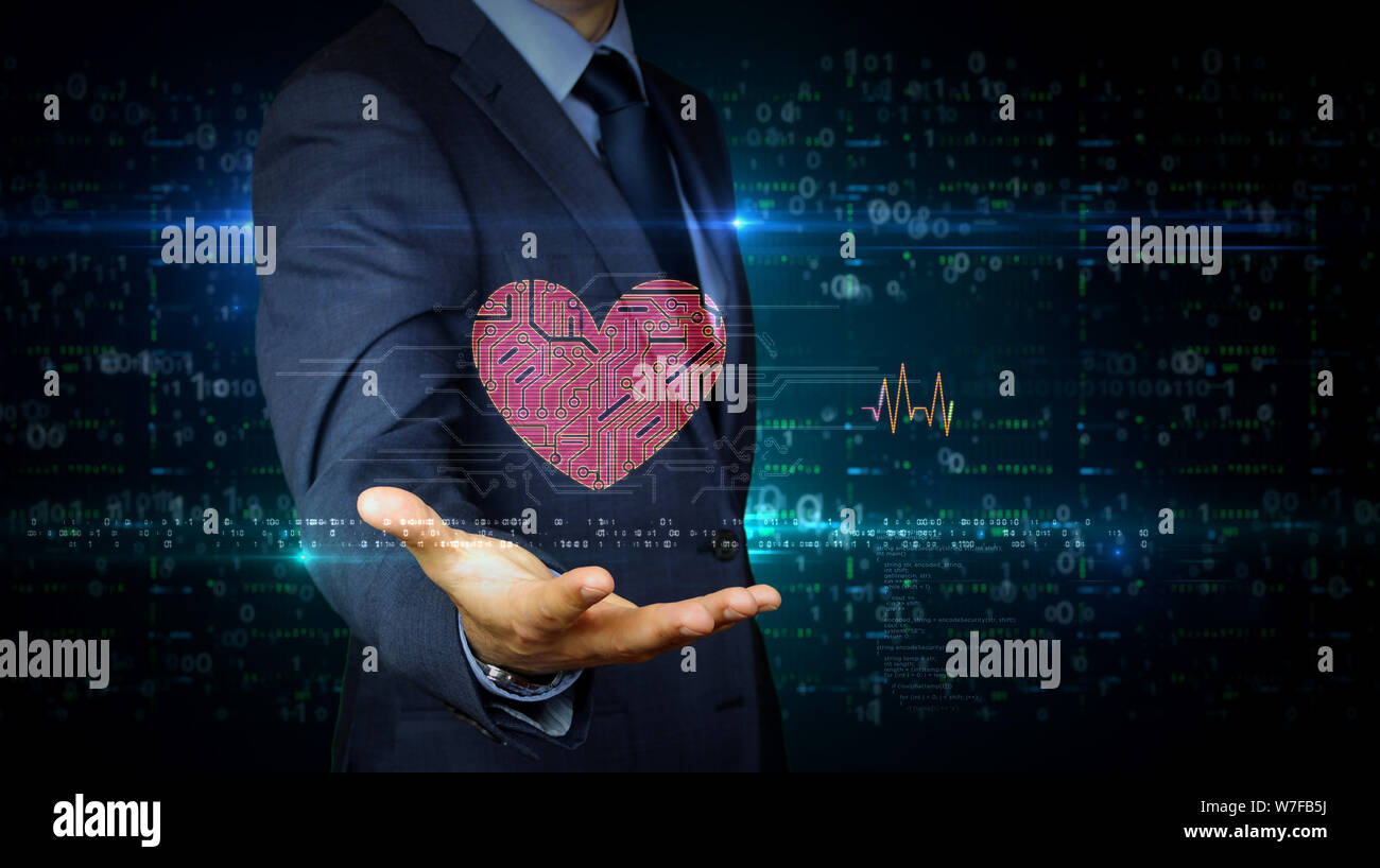 Geschäftsmann im Anzug tippen Sie auf dem Bildschirm mit Kybernetischen Herzsymbol Hologramm. Mann mit Hand auf Virtual Display. Liebe, cyber dating, romantisch, Gesundheit Stockfoto