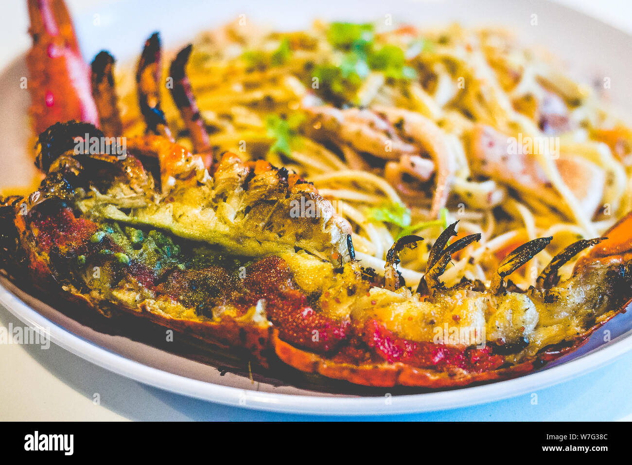 Aglio Olio La Kanadischen linguine (mit squid Schichten und kanadischen Halber Hummer) Stockfoto