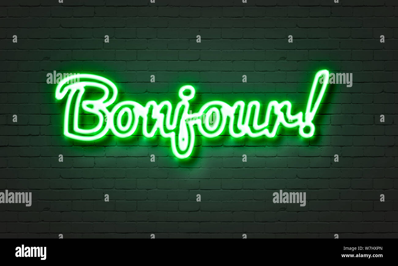 Bonjour Leuchtreklame auf Mauer Hintergrund Stockfoto