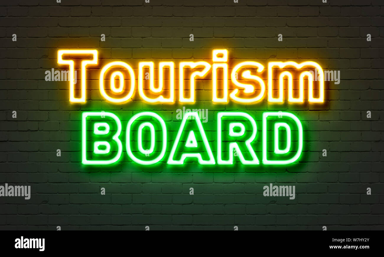 Tourism Board Leuchtreklame auf Mauer Hintergrund Stockfoto