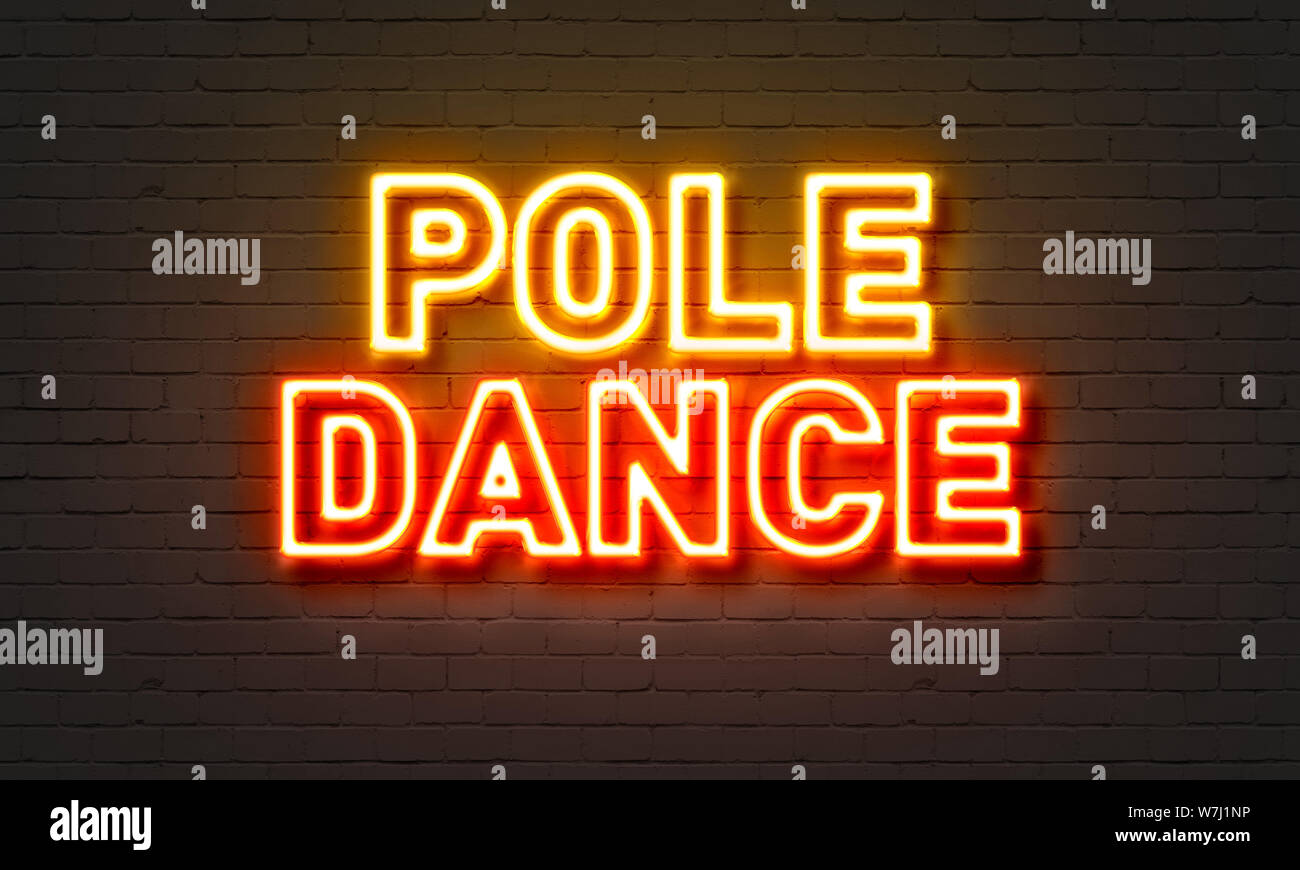 Pole Dance Leuchtreklame auf Mauer Hintergrund Stockfoto