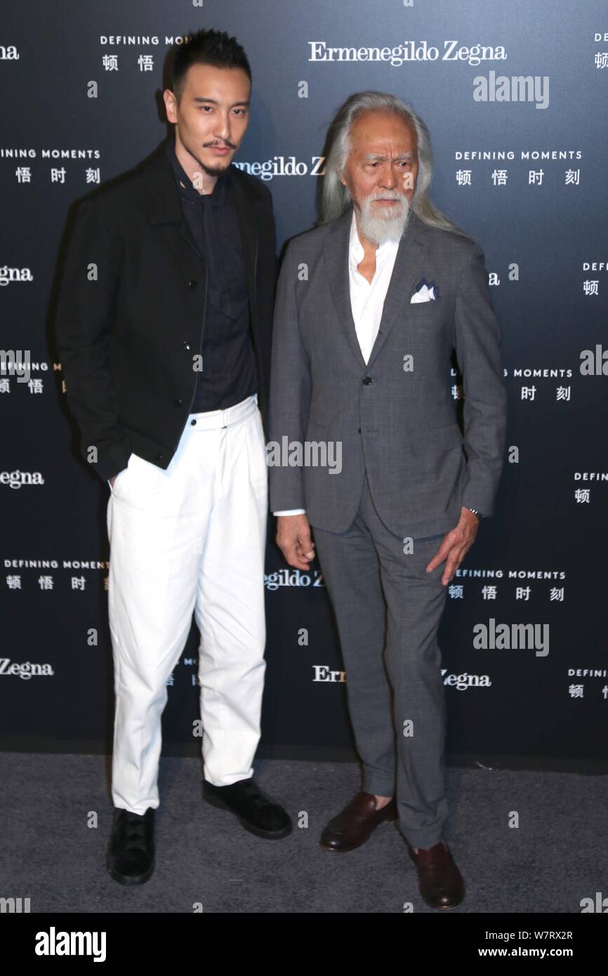 Der 81-jährige chinesische Modell Wang Deshun, rechts, und American-born taiwanesische Schauspielerin und Modell Sunny Wang darstellen, wie sie an der Ermenegildo Zegna 'Def ankommen Stockfoto