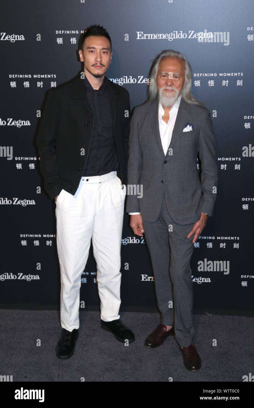 Der 81-jährige chinesische Modell Wang Deshun, rechts, und American-born taiwanesische Schauspielerin und Modell Sunny Wang darstellen, wie sie an der Ermenegildo Zegna 'Def ankommen Stockfoto