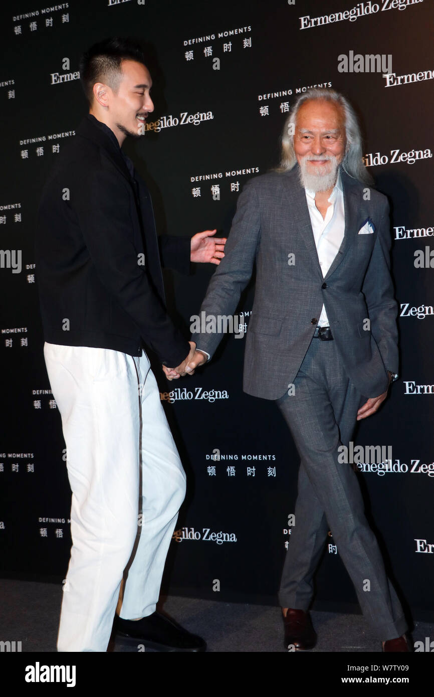 Der 81-jährige chinesische Modell Wang Deshun, rechts, und American-born taiwanesische Schauspielerin und Modell Sunny Wang darstellen, wie sie an der Ermenegildo Zegna 'Def ankommen Stockfoto
