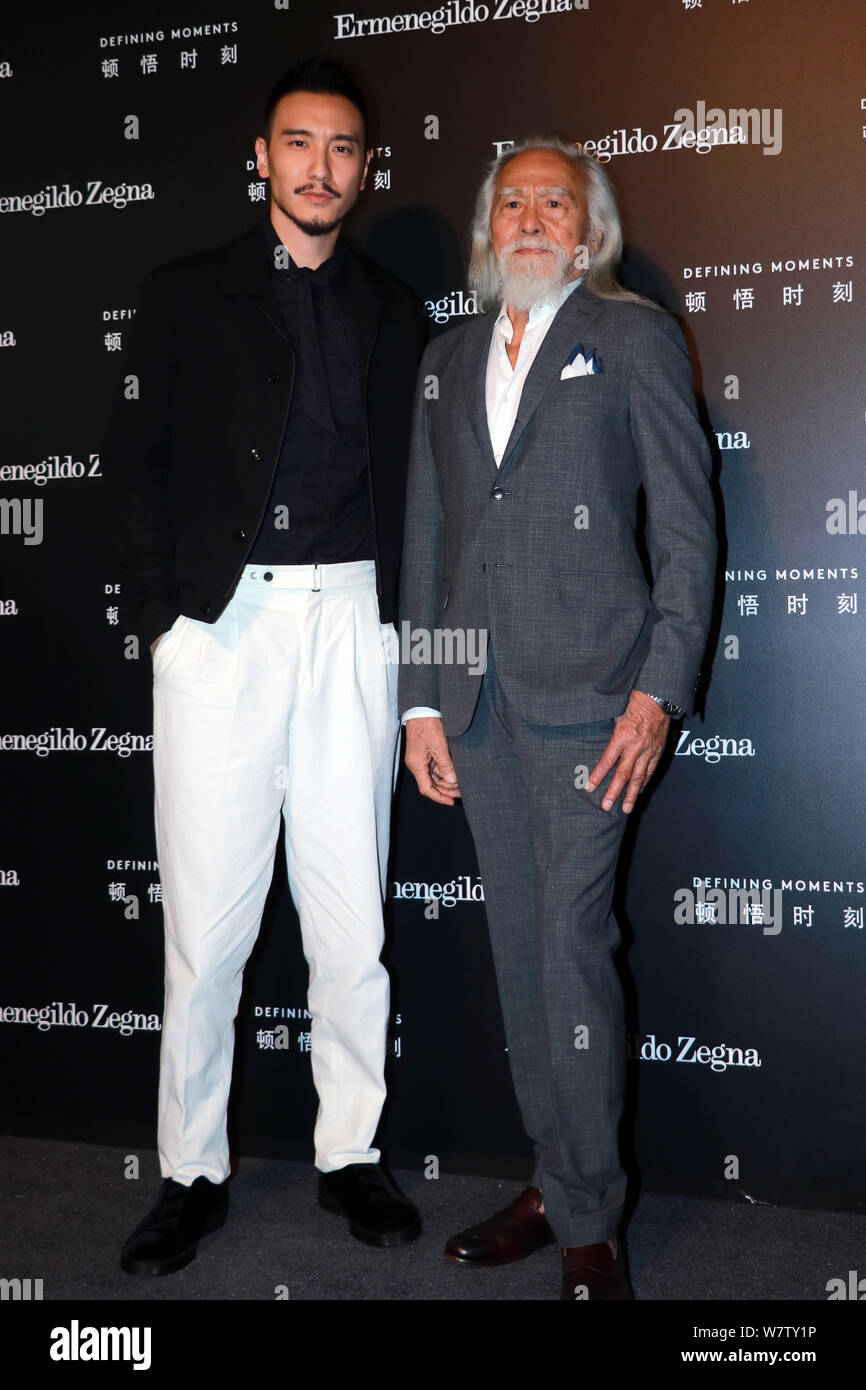 Der 81-jährige chinesische Modell Wang Deshun, rechts, und American-born taiwanesische Schauspielerin und Modell Sunny Wang darstellen, wie sie an der Ermenegildo Zegna 'Def ankommen Stockfoto