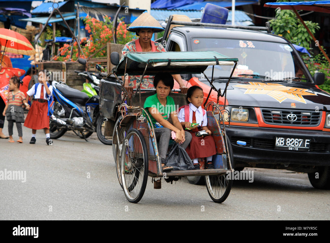 Fahrrad Rikscha, singkawang Stadt. West Kalimantan, indonesische Borneo. Juli 2010. Stockfoto