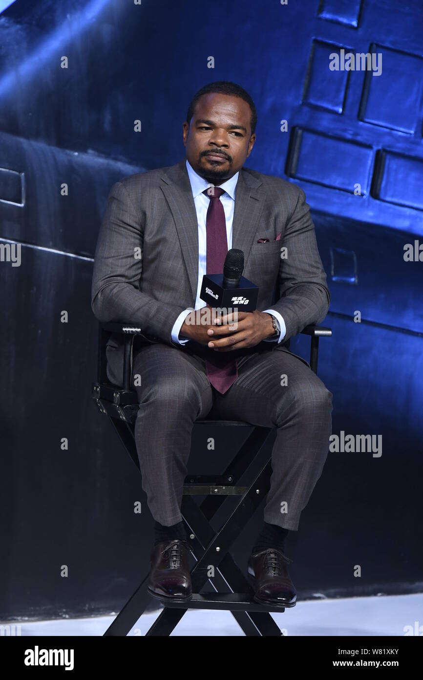 Der amerikanische Regisseur F. Gary Gray besucht eine Premiere für seinen neuen Film "Das Schicksal der Wütende" in Peking, China, 23. März 2017. Stockfoto