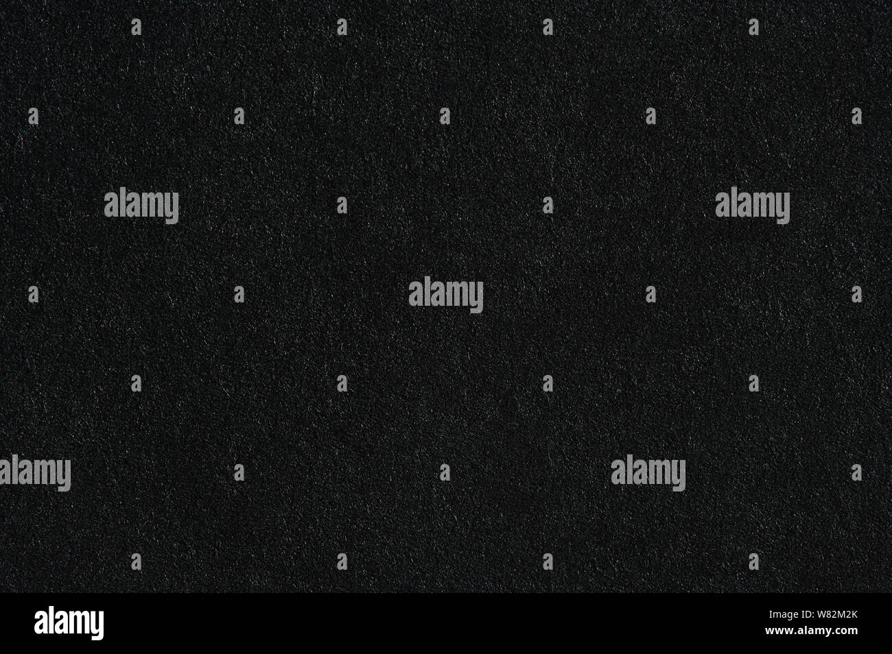 Rauhe schwarze Papier Hintergrund Textur Nähe zu sehen. Stockfoto