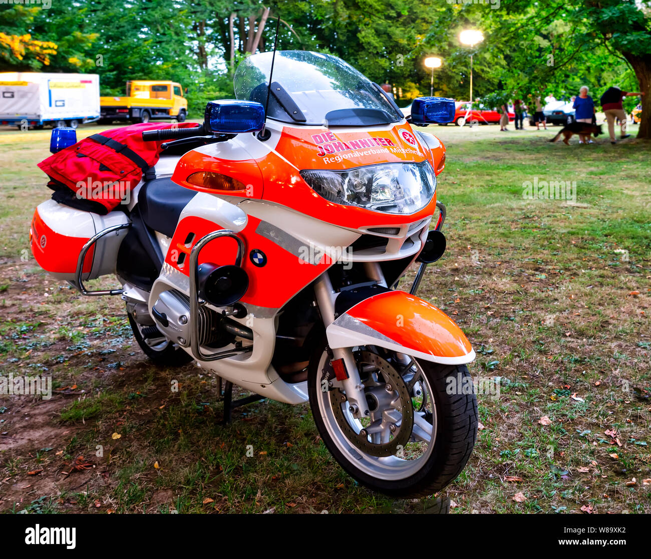 Laubach, Germany, 08/03/2019:Vehicle from the Johanniter motorcycle squadron parked in the castle garden Laubach for emergencies Stockfoto