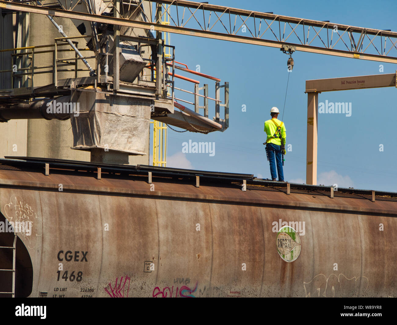 Mais in ein Hopper railroad Auto geladen Stockfoto