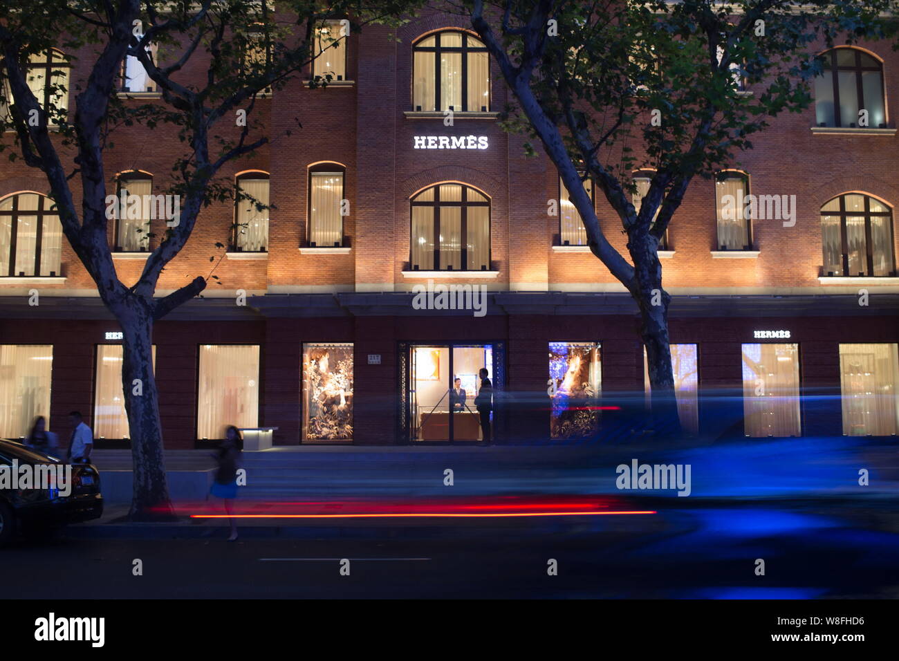 ------ Nacht Blick von Maison Hermes in Shanghai, China, 25. September 2014. Hermes Geschäftsführer Axel Dumas sagte Geschäftsentwicklung in China würde Stockfoto