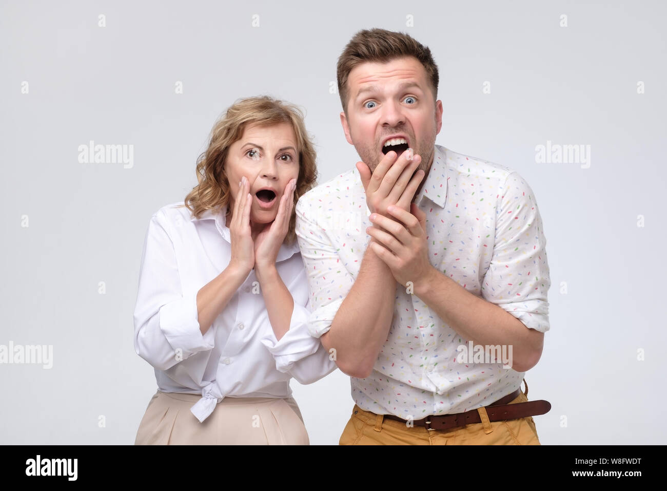 Reife Frau und Mann hören Schockierende Neuigkeiten. Stockfoto