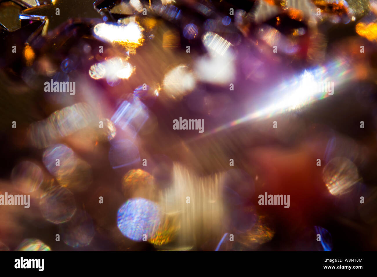 Glatte multicolor Flecken von hellem Licht auf schwarzem Hintergrund Stockfoto