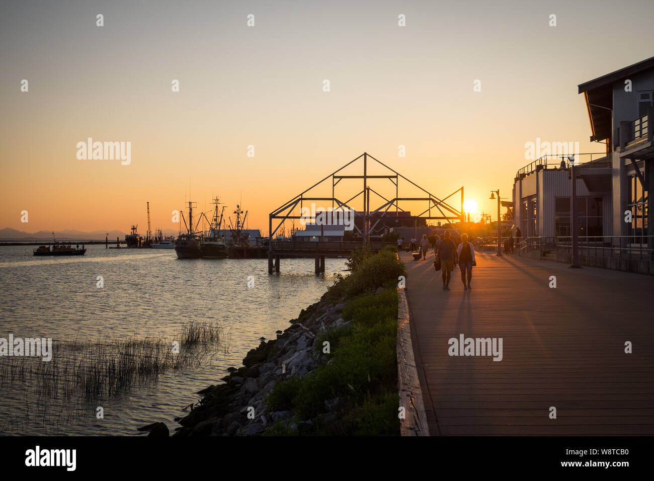 Sonnenuntergang über Fisherman's Wharf in Steveston Village, Richmond, Vancouver, British Columbia, Kanada. Stockfoto