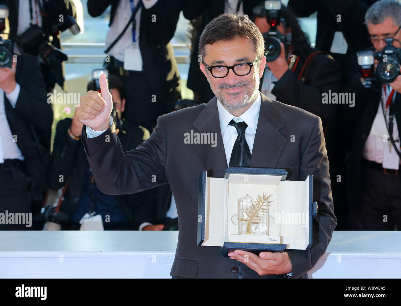 Türkische Schauspieler und Regisseur Nuri Bilge Ceylan stellt mit seinem Palme dOr Auszeichnung nach dem Gewinn der beste Film Award für seinen Film, Winterschlaf, phot Stockfoto