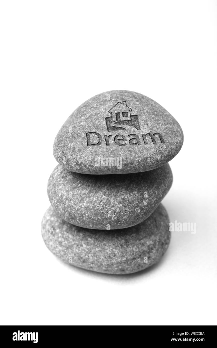 Stein mit Dream Home-Symbol auf der Oberseite Stockfoto