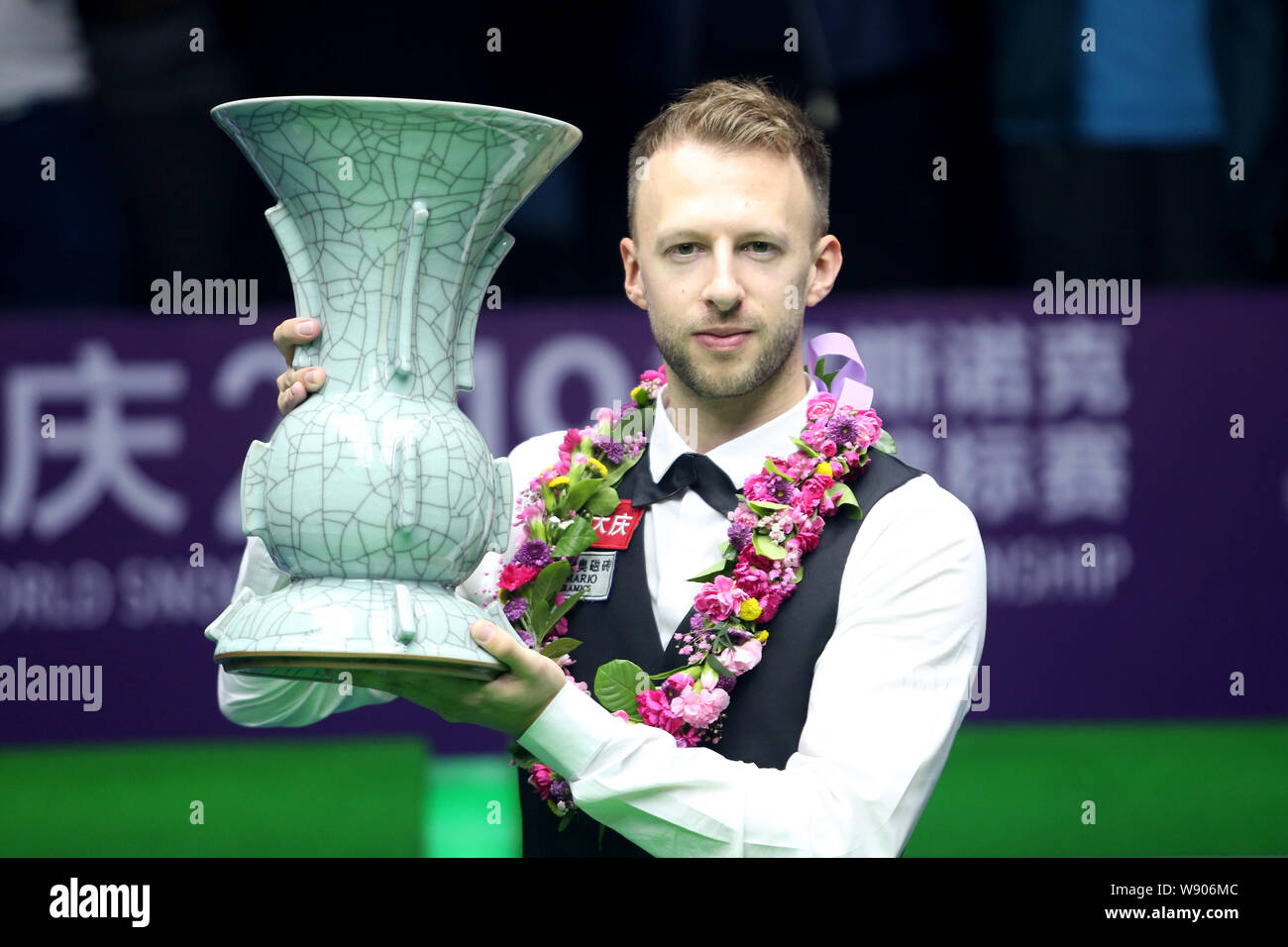 Judd Trump von England gewinnt die Meisterschaft im letzten Spiel während der 2019 World Snooker internationale Meisterschaft in Daqing Stadt, im Nordosten der chinesischen Provinz Heilongjiang, 11. August 2019. Stockfoto