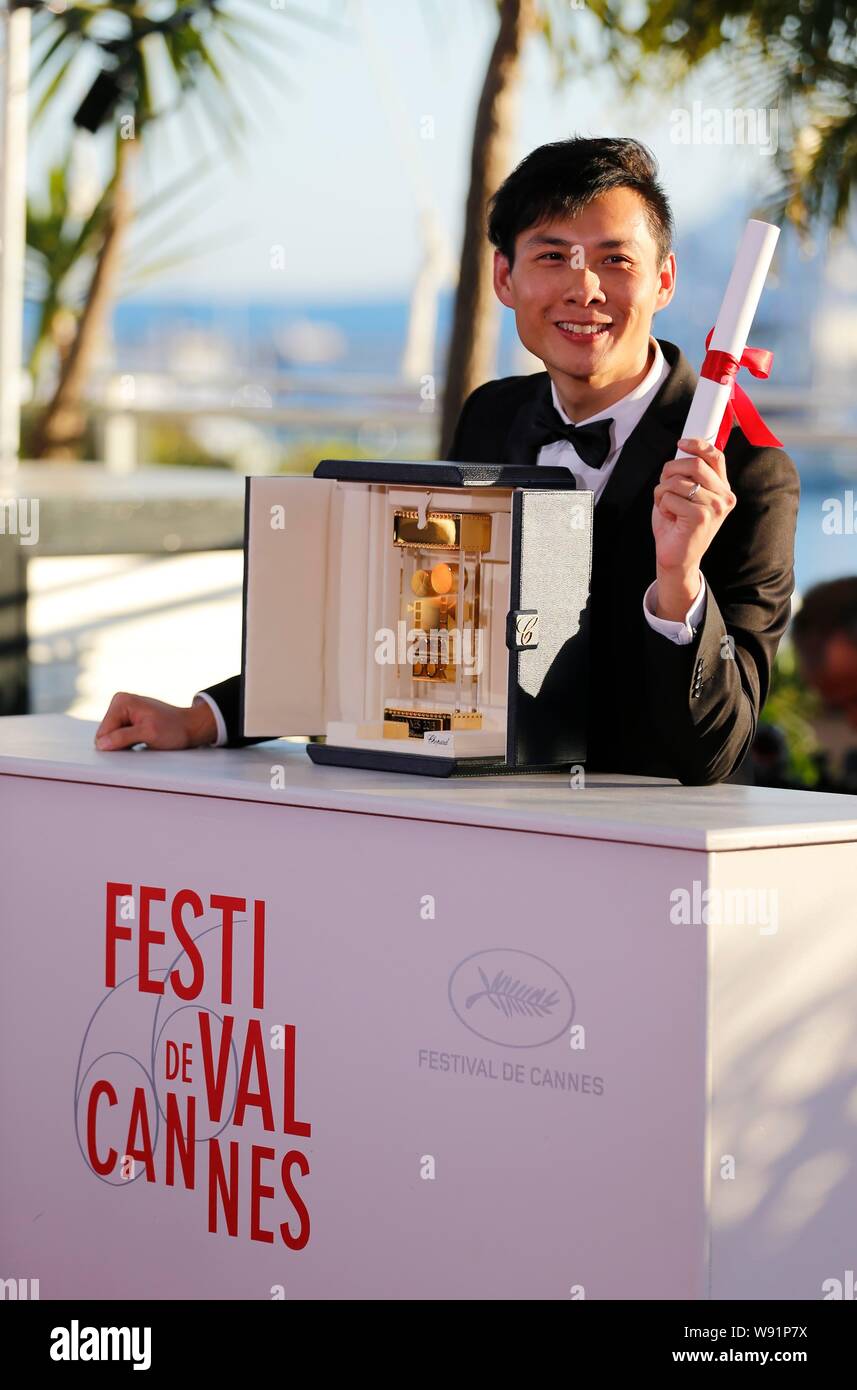 Singaporean Regisseur Anthony Chen stellt nach dem Gewinn der Kamera dOr Award für seinen Film, Ilo Ilo, am Fotoshooting für die Preisträger als Teil der closi Stockfoto