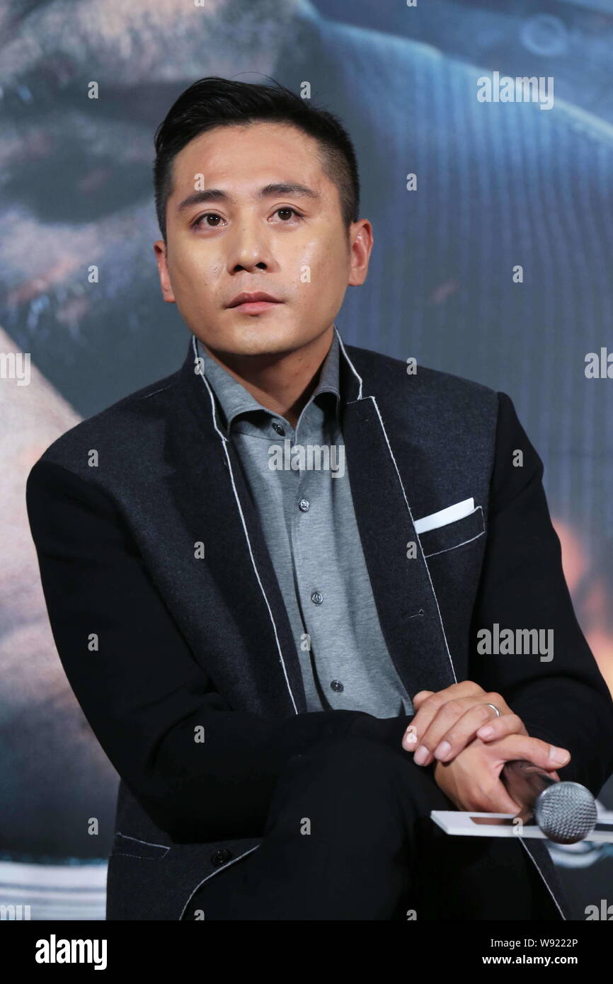 Chinesische Schauspieler Liu Ye stellt auf einer Pressekonferenz zu seinem neuen Film, Police Story 2013, in Peking, China, 8. Dezember 2013. Stockfoto