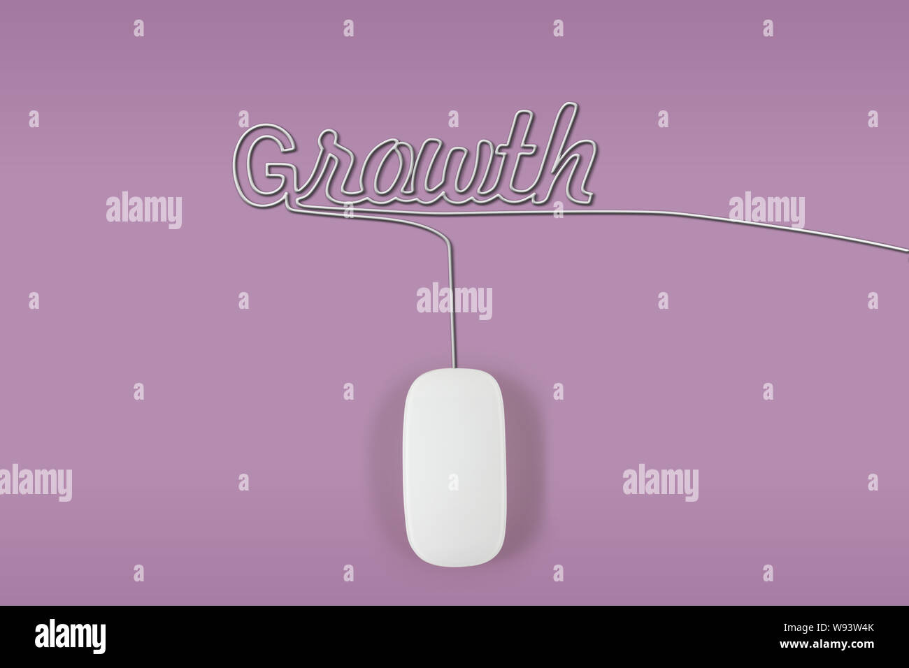 Computer-Maus mit seinem Draht macht ein Wort Wachstum Stockfoto