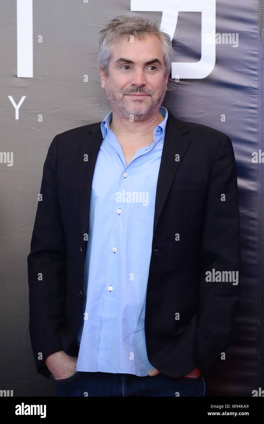 Mexikanischen Regisseur Alfonso Cuaron lächelt bei einer Pressekonferenz zur Premiere seines neuen Films, Schwerkraft, in Peking, China, 18. November 2013. Stockfoto