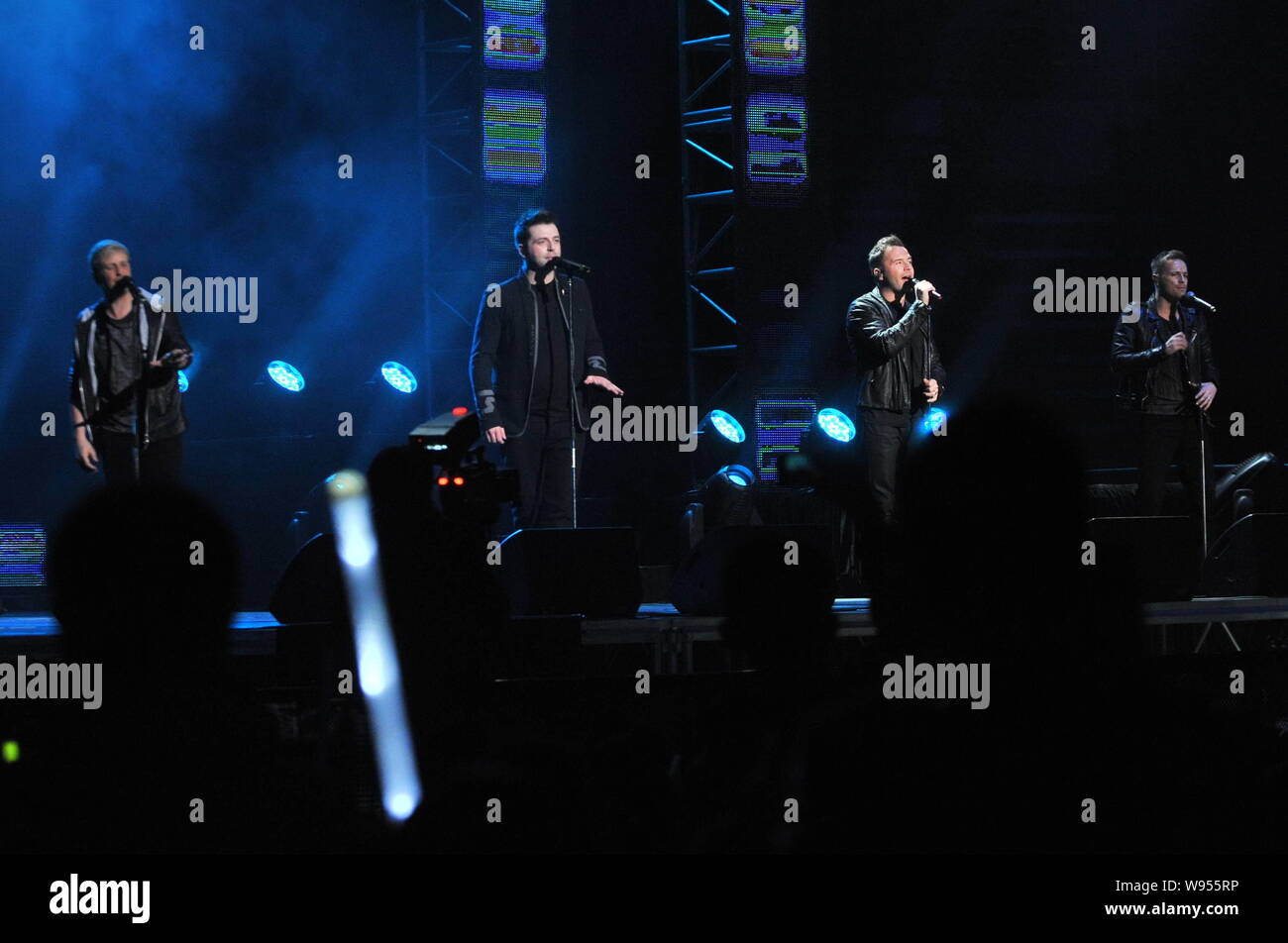 (Von links) Kian, Mark, Shane, Nicky der Irischen Boyband Westlife bei der Farewell Tour Konzert in Peking, China, 22. Februar 2012. Stockfoto