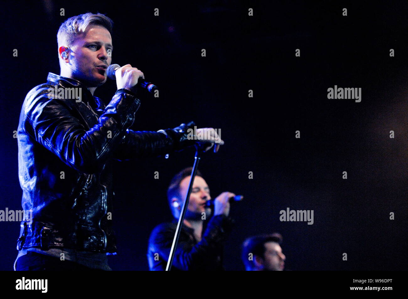 (Von links) Nicky, Shane und Mark der Irischen Boyband Westlife bei der Farewell Tour Konzert in Hongkong, China, 3. März 2012 durchführen. Stockfoto