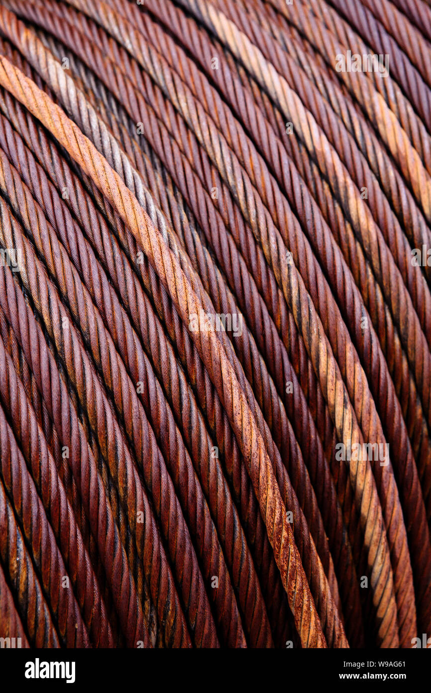 Hintergrund Bild einer Spule von alten industriellen Metall Kabel. Stockfoto