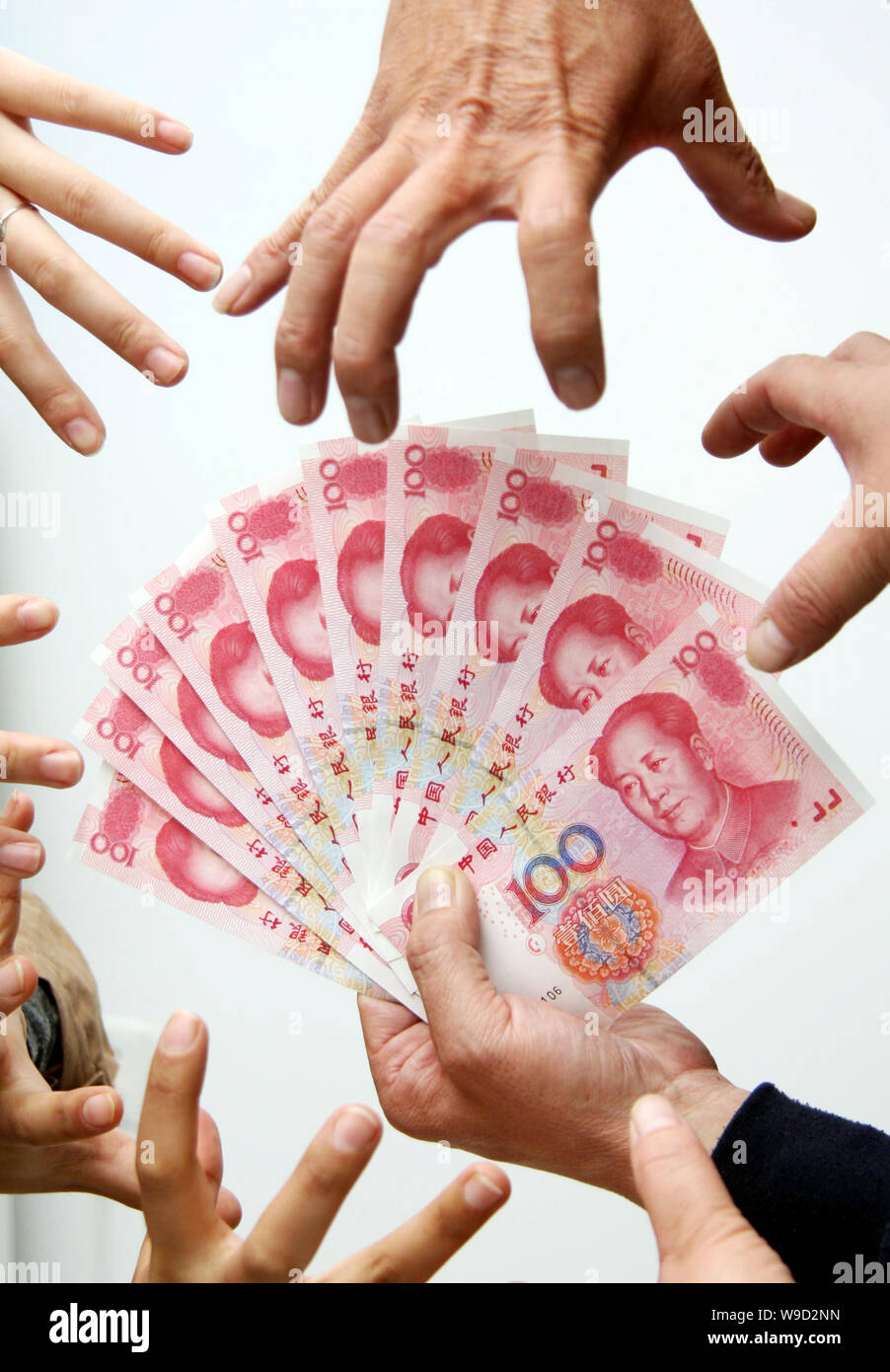 Creative foto Schlüsselwörter: China, Chinesisch, RMB, Renminbi Yuan CNY, Geld, Bank, Notiz, Banknote, Papier, Währung, Wirtschaft, Finanzen, Finanz, Hand, Hände, Finger, fing Stockfoto