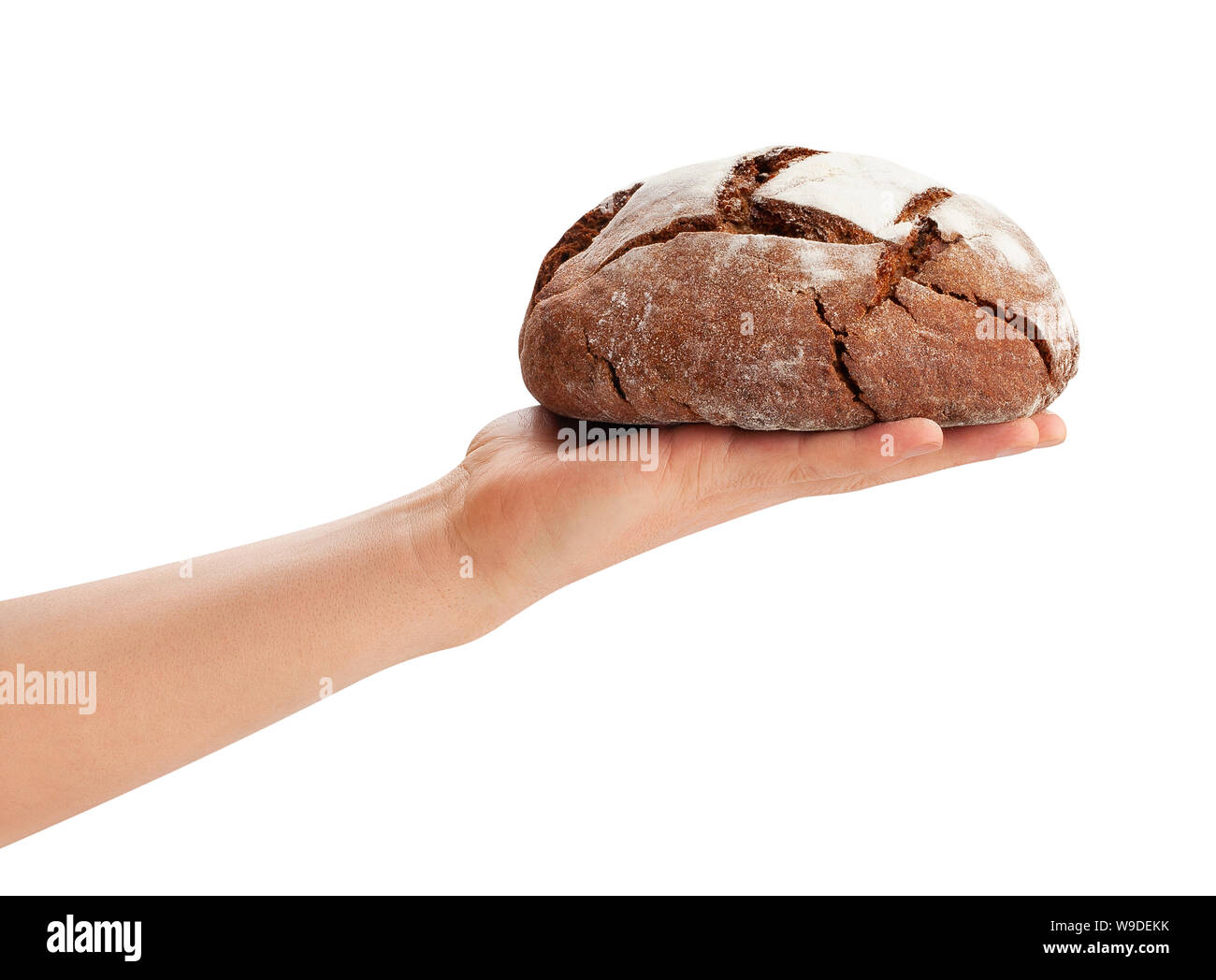 Braunes Brot in der Hand weg auf Weiß isoliert Stockfoto