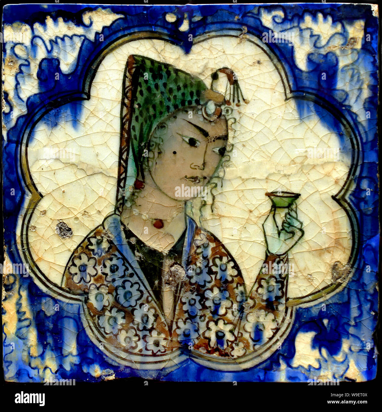 Fliese mit Abbildung 1590-1630 Ispahan Iran iranische islamische Kunst (isfahan von 1050 bis 1722 blühte, besonders im 16. und 17. Jahrhundert unter der Safavid Dynastie, als es das Kapital von Persien zum zweiten Mal in seiner Geschichte wurde unter Schah Abbas dem Großen. ) Stockfoto