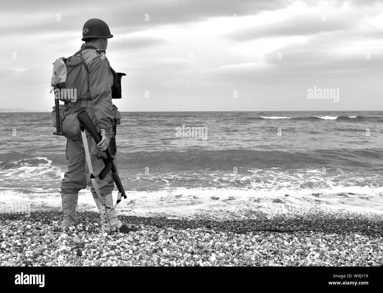 US-Soldat (re en-Schauspieler) nachgespielt D Tag Strand Anlandungen in Dorset Stockfoto