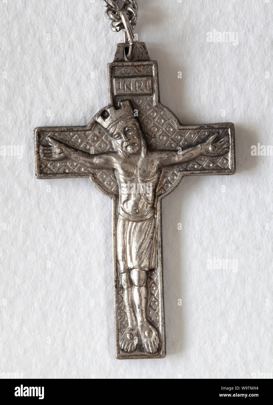Vintage Kreuz Anhänger - Jesus Christus am Kreuz Stockfoto