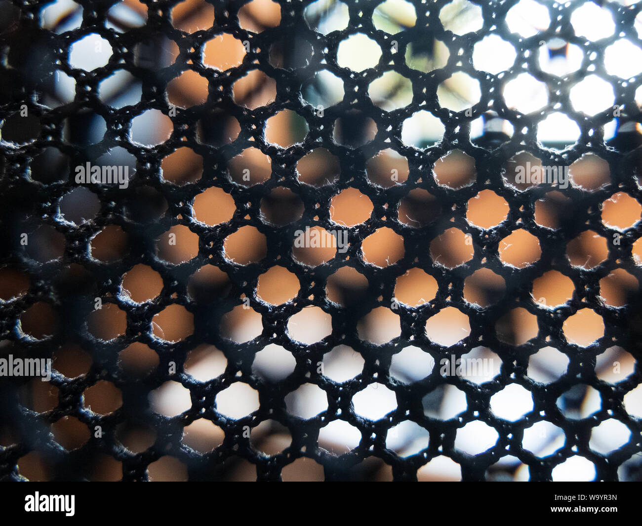 Schwarz textile transparente Polstermöbelindustrie mesh. Hintergrund strukturierte nahtlose Muster. Stockfoto